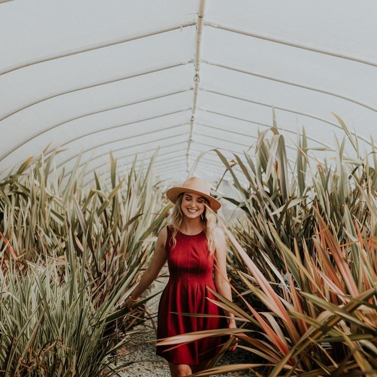Kaveri Mehta, Lead Design Curator at Grove Canvas Market, reviewing corporate floral arrangements